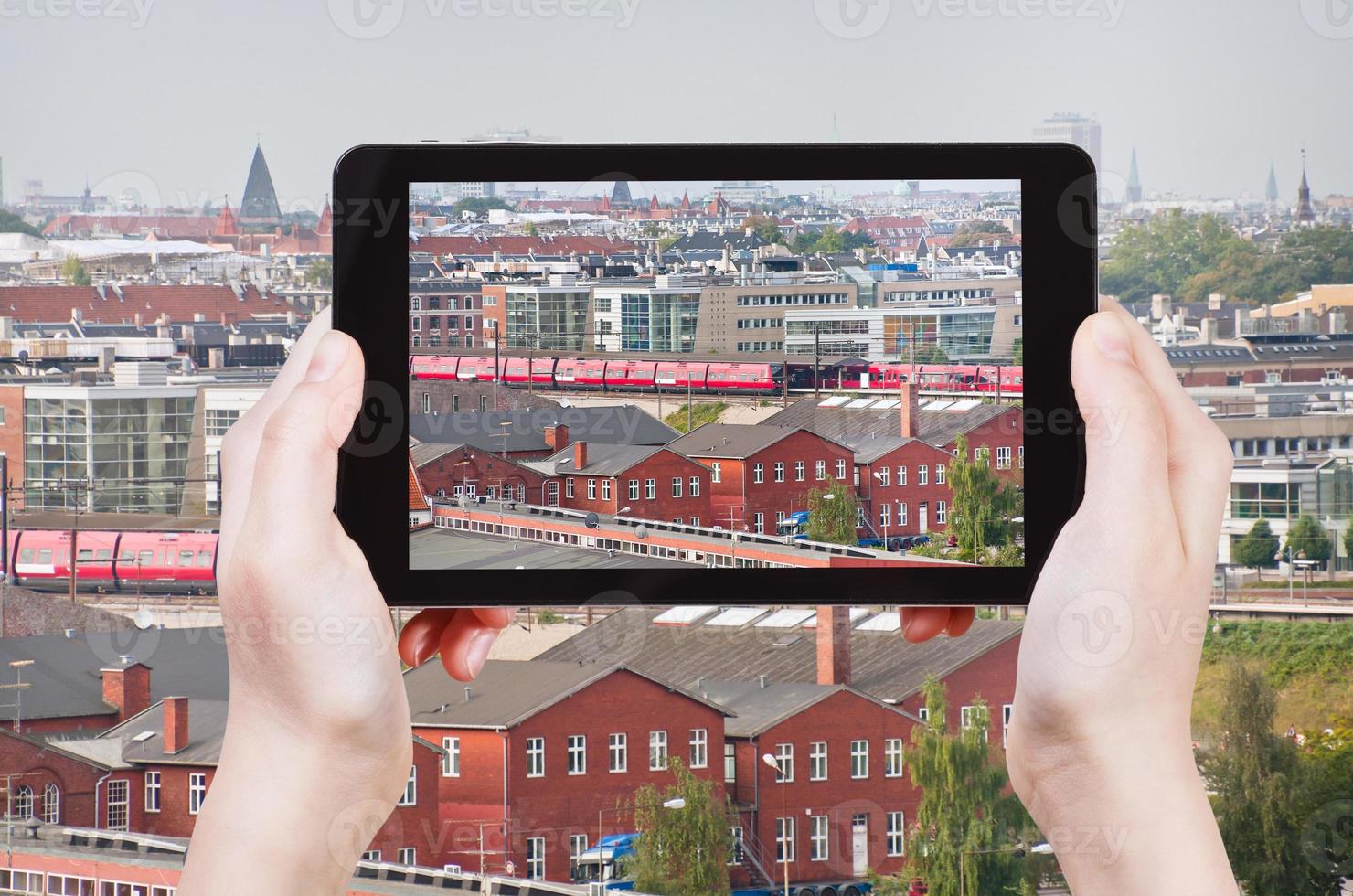 tourist taking photo of Copenhagen skyline