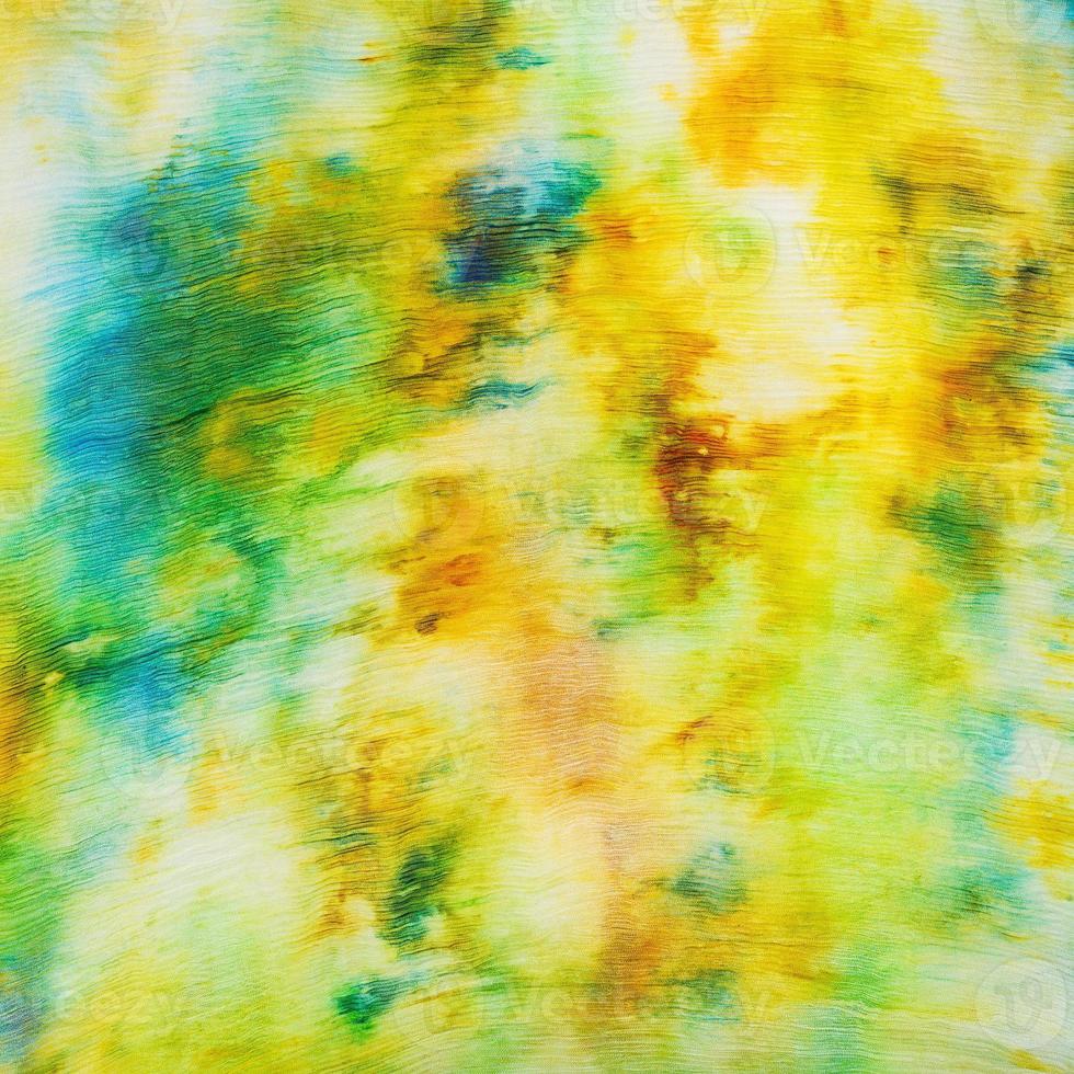 batik - abstract yellow and green spots on silk photo