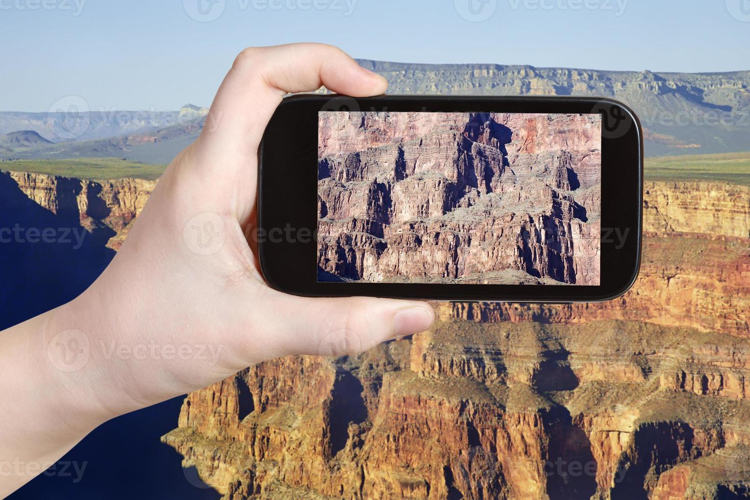 taking photo of rocky mountains in Grand Canyon