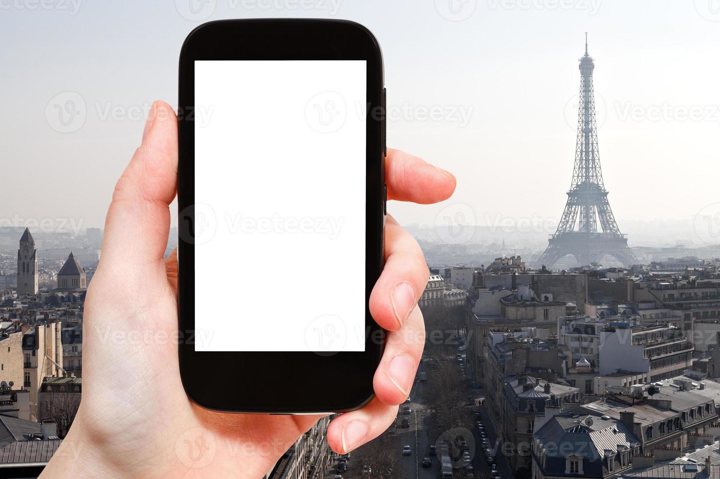 smartphone with cut out screen and Eiffel tower photo