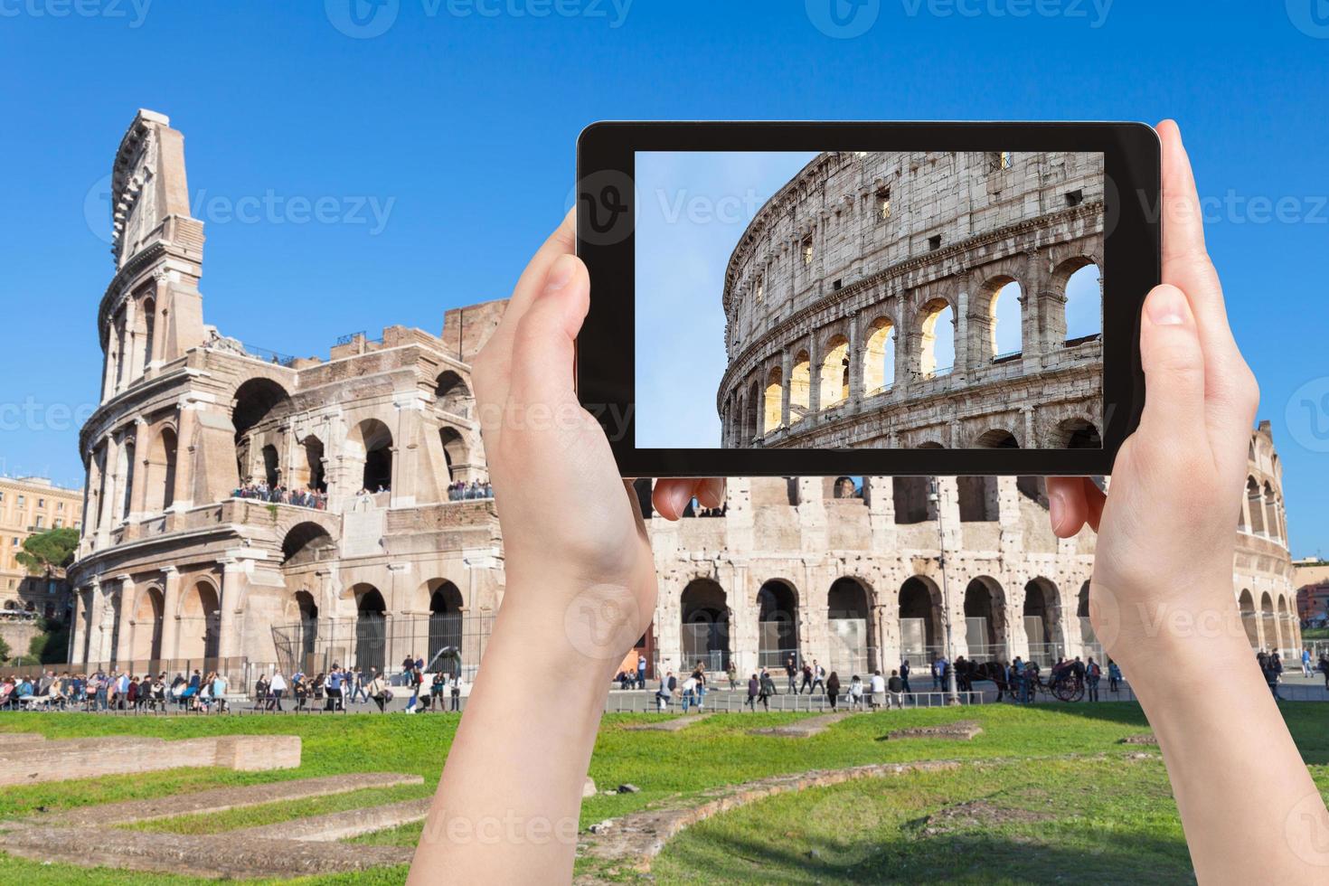 tourist photographs Colosseum in Rome city photo