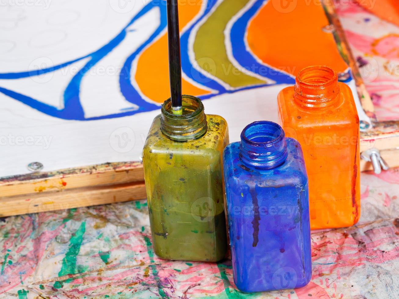 color bottles with dyes photo