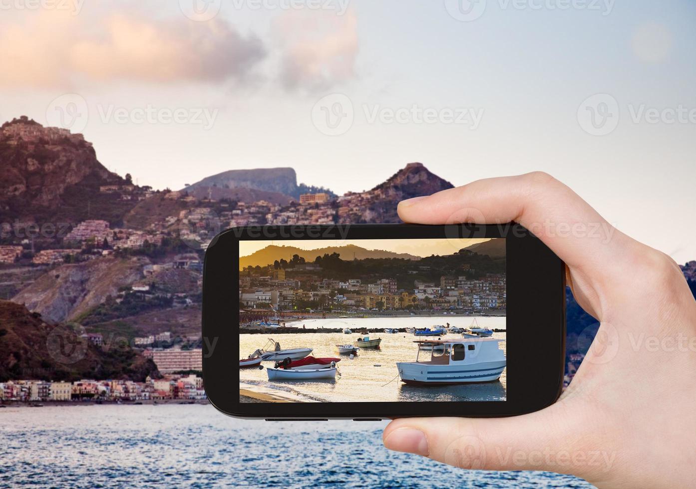 picture of boats at sunset, Taormina, Sicily photo