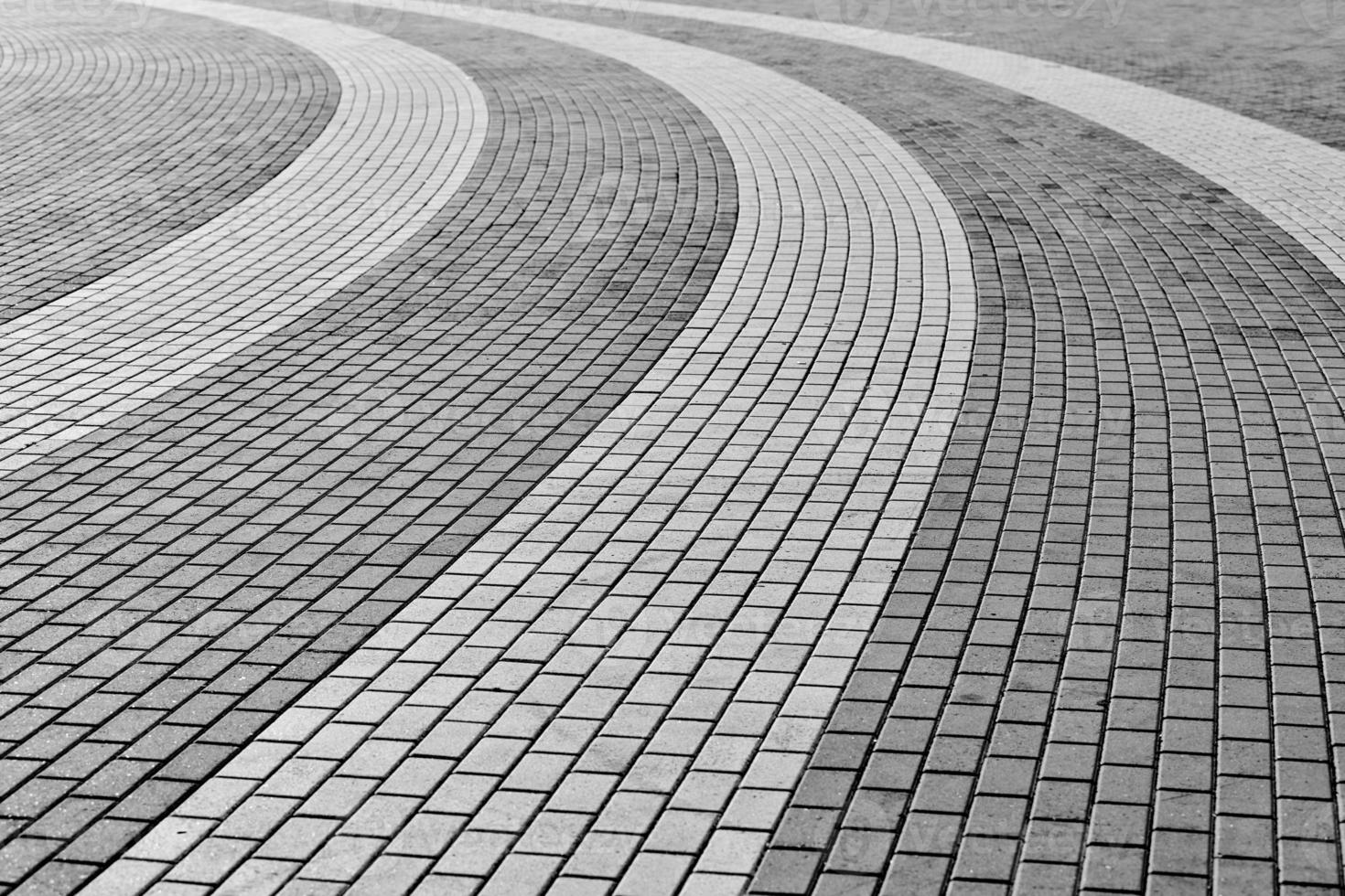 Circle tile road. Stone pavers in city park photo