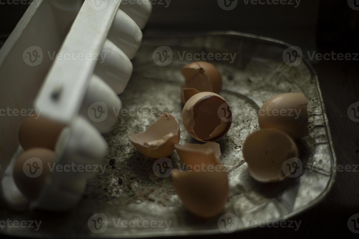 Broken eggs. Eggshell. Chicken eggs are on table. Food Details. photo