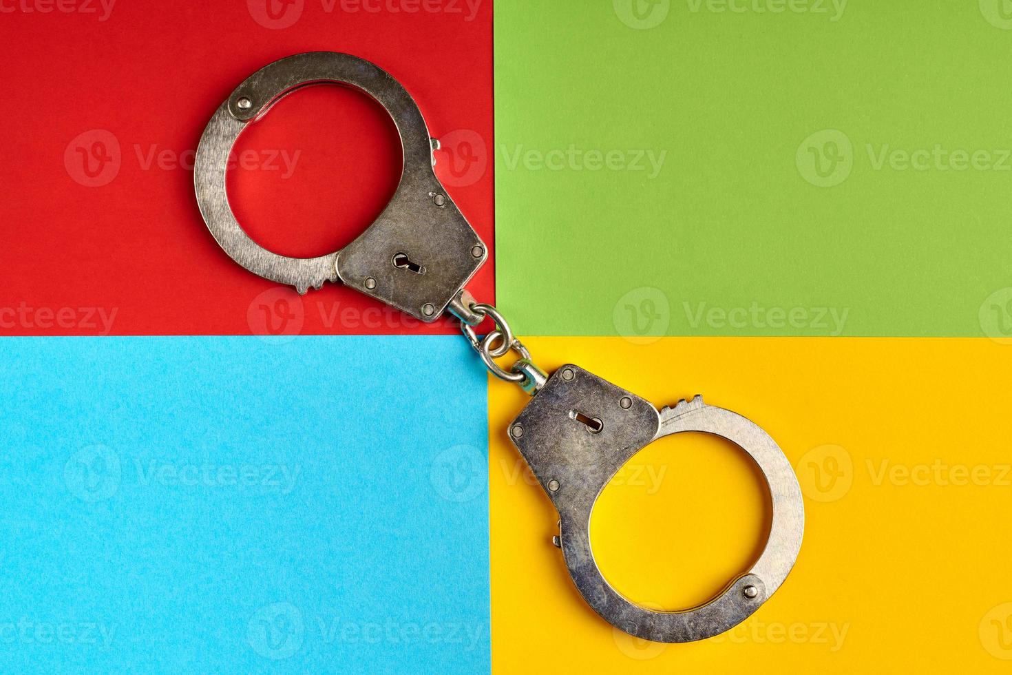 Red, green, blue, yellow paper colours. Corporation logo, hackers concept. photo