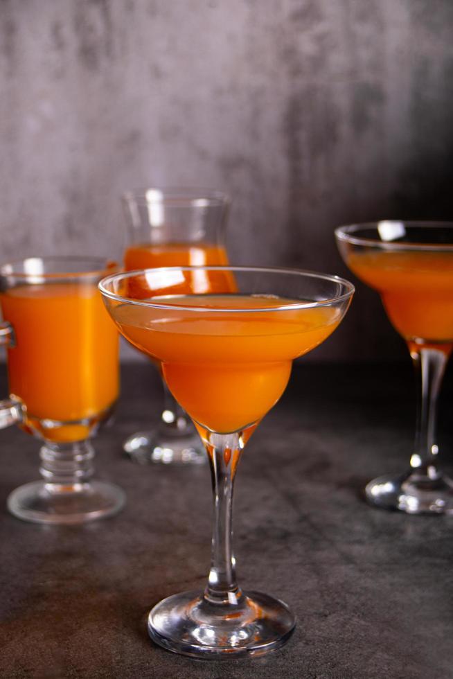 Pumpkin fall seasonal drink cocktail latte with spices and whipped cream for Thanksgiving or Halloween party festive celebrate photo