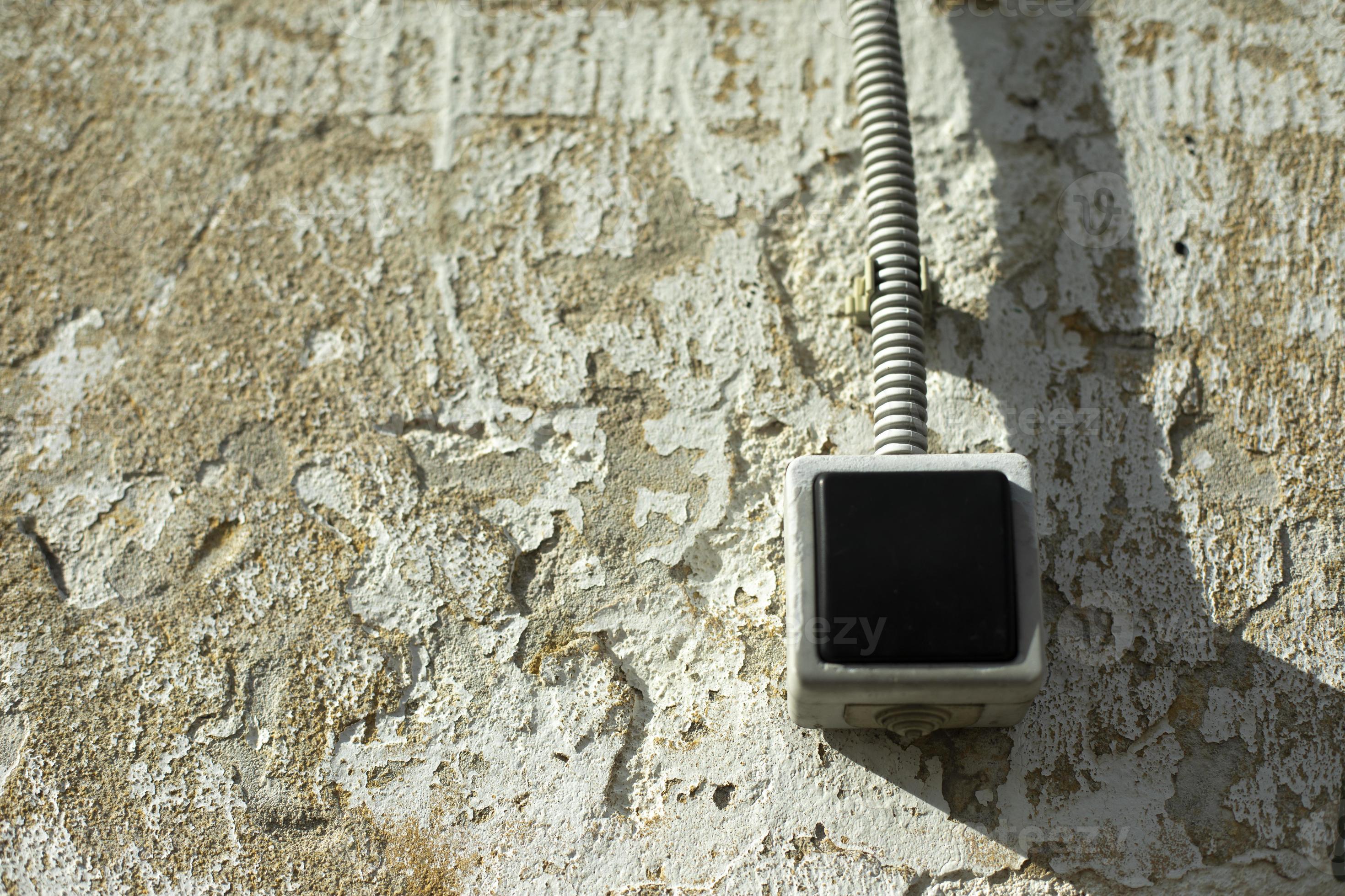 Wall switch. Button for light. Wire to button. Wall with switch. 12613399 Stock Photo at Vecteezy