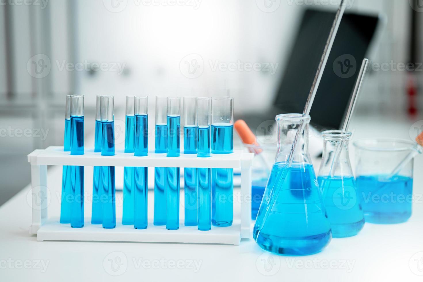 Breakers and glassware in chemistry labs scientific concept analysis biological medicine
