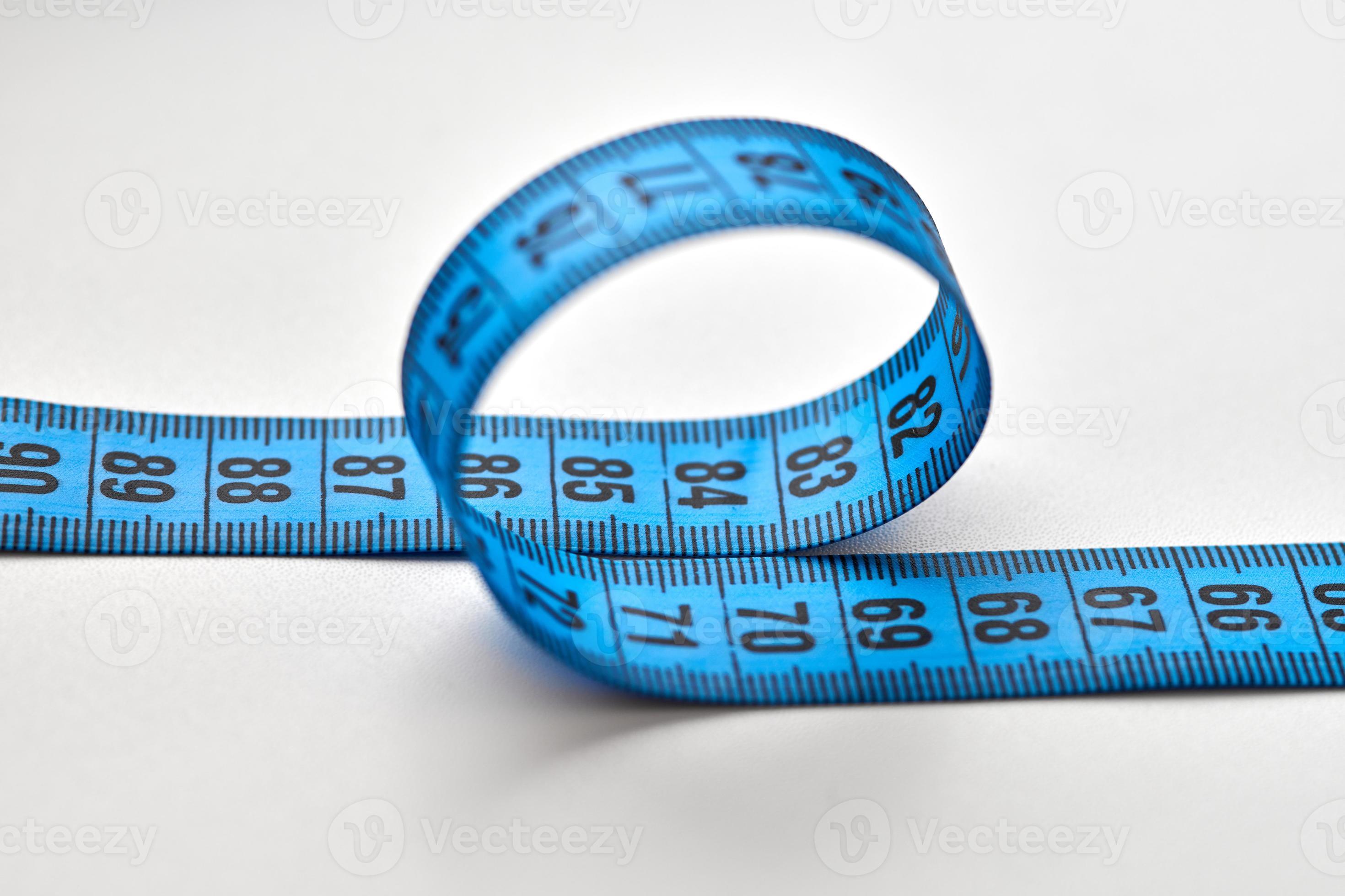 Blue measuring tape isolated on white background 12613715 Stock Photo