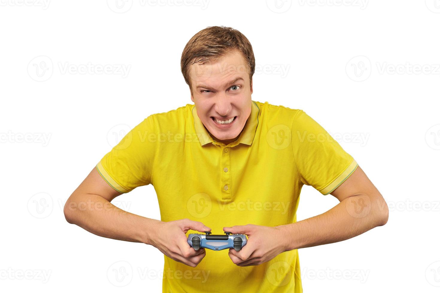 Funny handsome gamer with gamepad, excited video game player isolated on white background photo