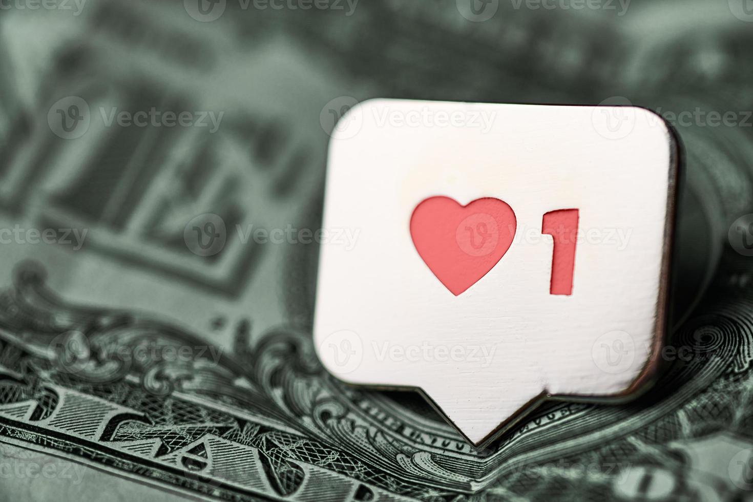 Like heart symbol on dollar photo