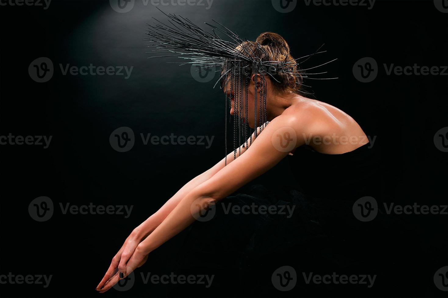 portrait of young beautiful woman like witch with red lips and black crown on dark background. Black dark beauty, Halloween concept photo