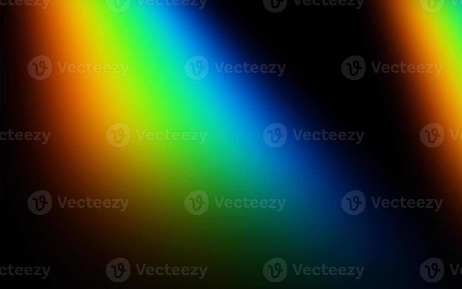 Rainbow color gradient on black background for texture overlay. Abstract creative texture for banner, wallpaper, backdrop, etc. Fun and cheerful vibes for photo effect lighting overlay