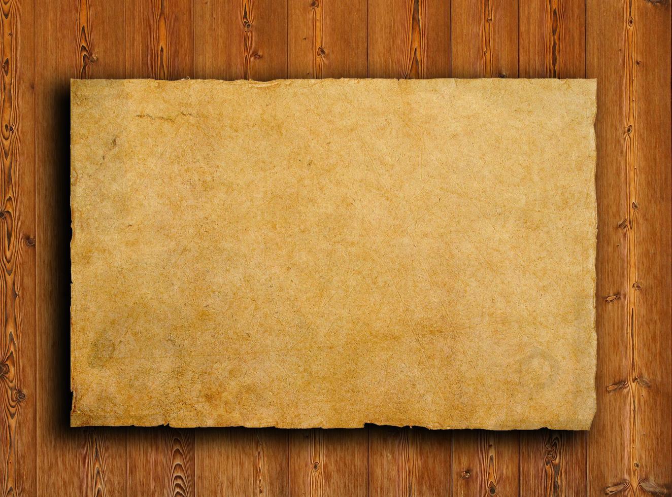 old paper on brown wood texture with natural patterns photo