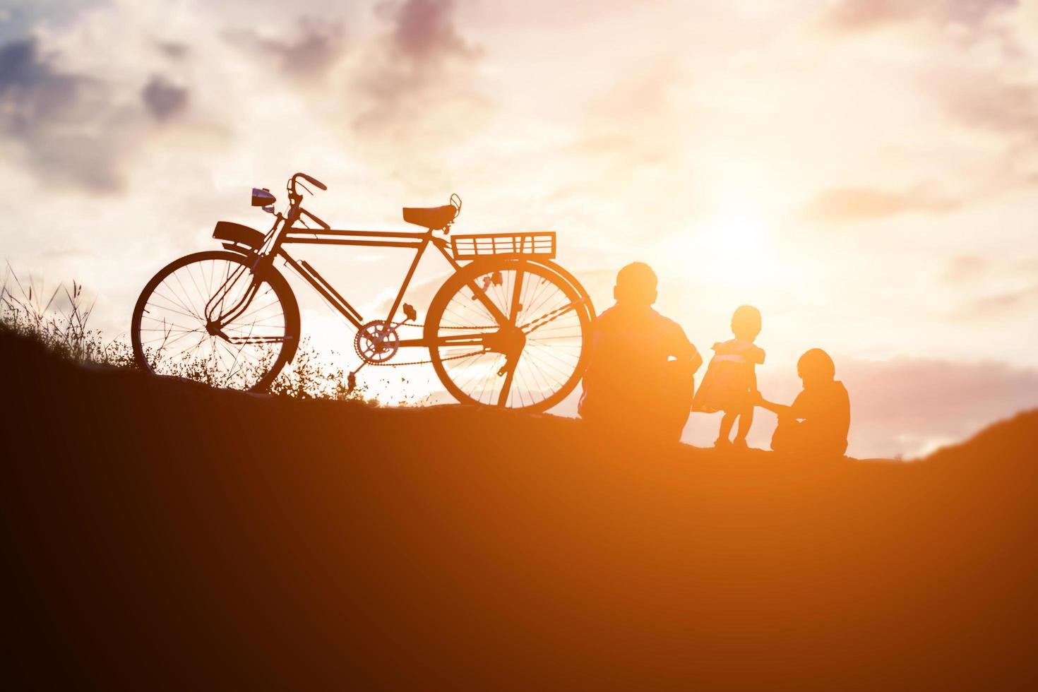 Biker family silhouette father and son photo