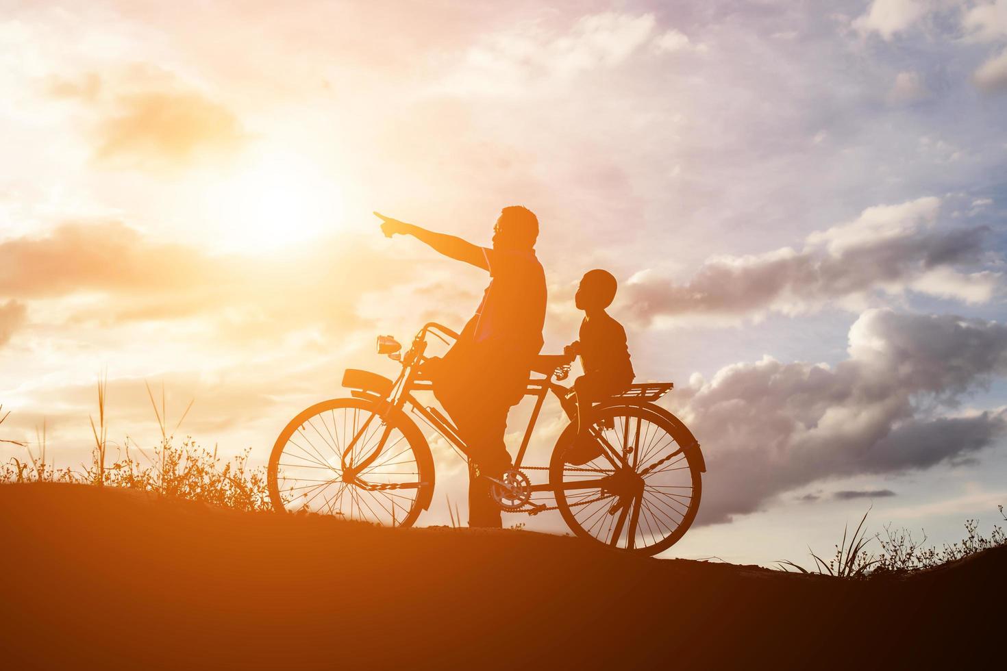 Biker family silhouette father and son photo