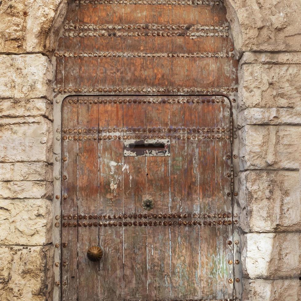 Texture of old wood, texture of a wooden door with a natural pattern. background. photo