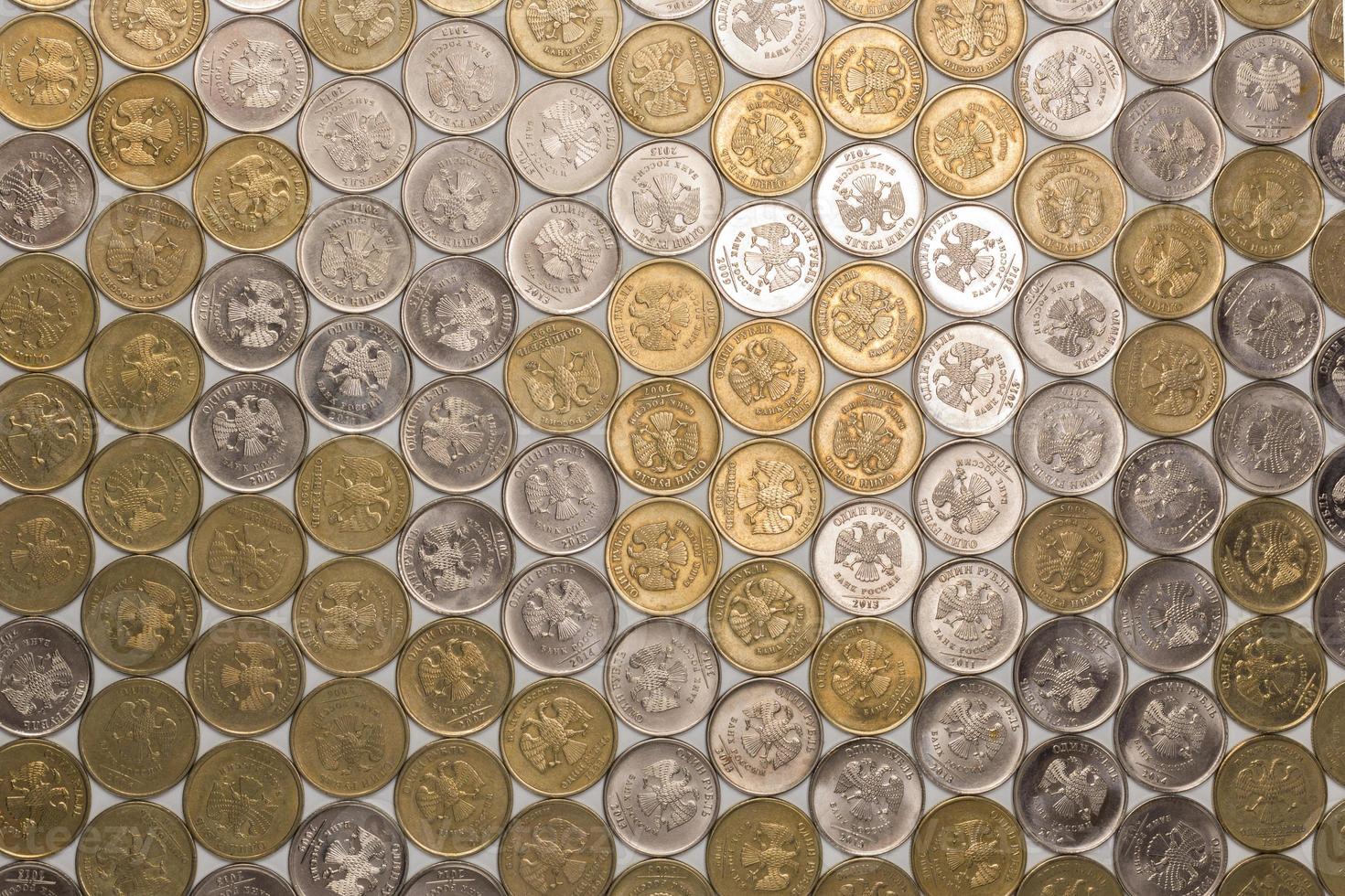 One rubl coins tile flat background, directly above perspective photo