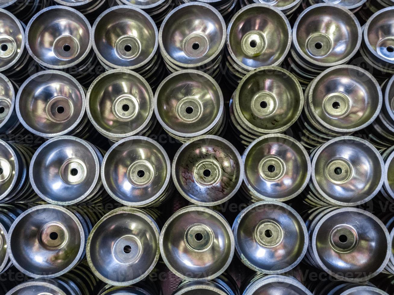 batch of thick alluminium stamped half-spherical parts photo