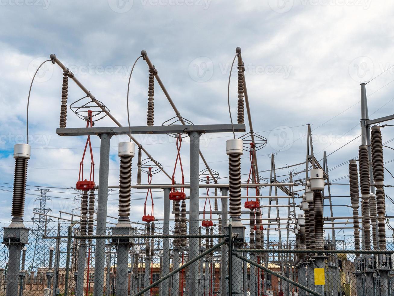 a view of an electric power station under grey cloudy sky photo