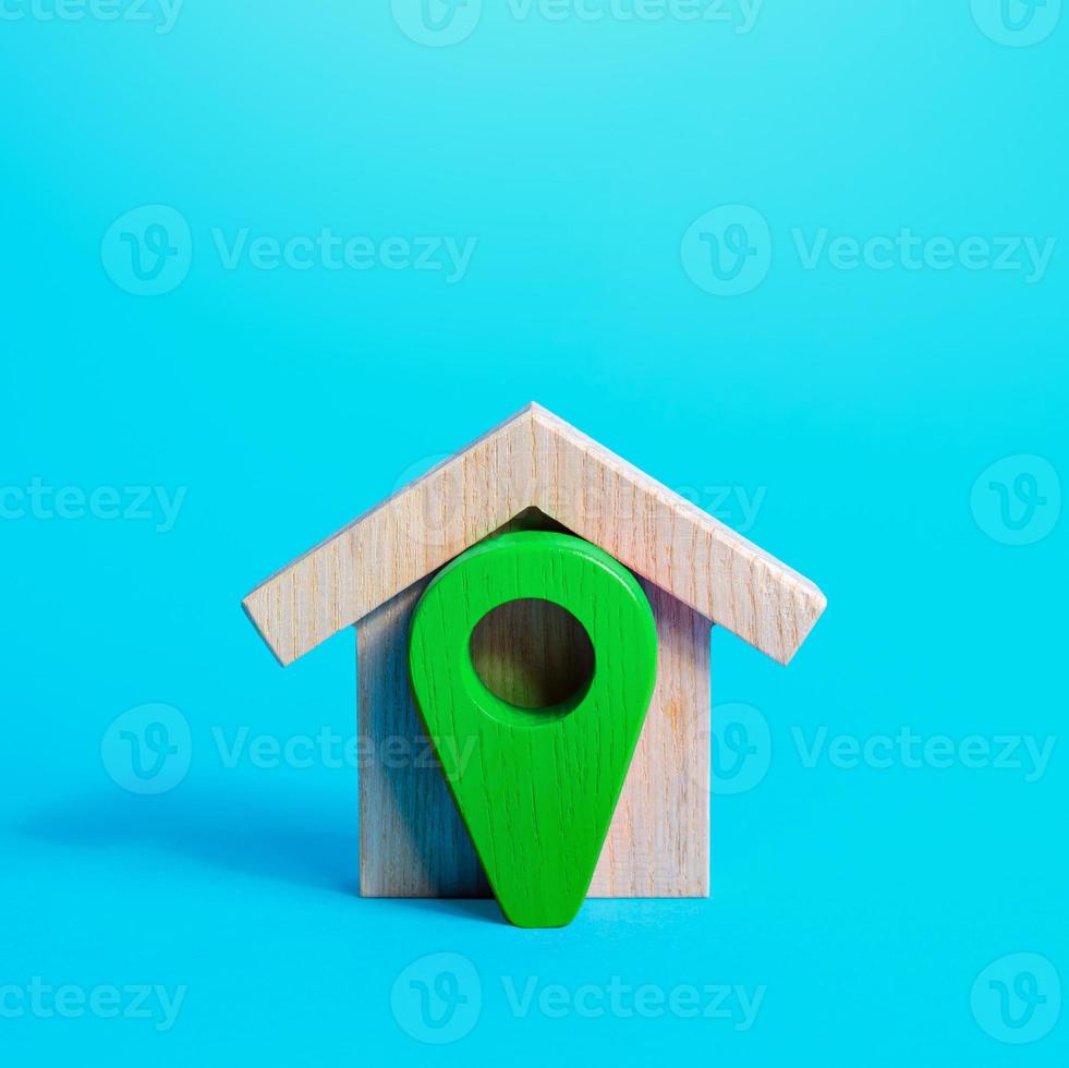 House and green location pin. Ecological housing, green technologies in building. Concept of finding a home to buy or rent. House moving company. Delivery place. photo