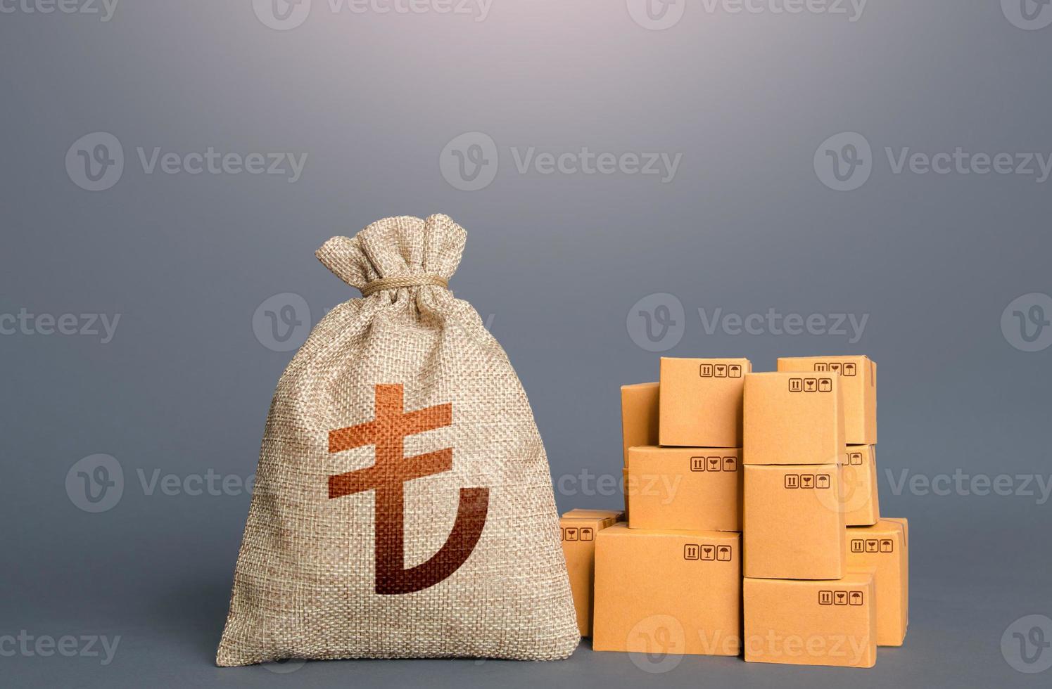 Boxes and turkish lira money bag. The concept of trade in goods and production. Profit from trading. GDP economy. Import export. Warehousing logistics. Business industry. Delivering. photo