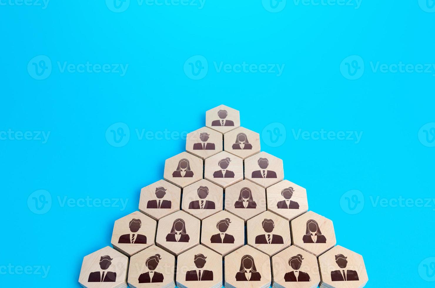 People grouped in an arrow formation. Attracting supporters, building a consolidated force. Common interest, problem solving. Team, teamwork cooperation. Unity joining. Business company hierarchy photo