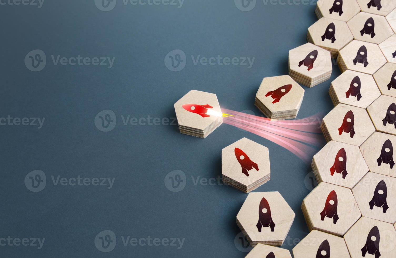 Red rocket takes off from ordered structure of others. Blast off. Startup success, breakthrough technology. Innovation, breaking new ground. Successful investment. Business unicorn. Choosing best idea photo