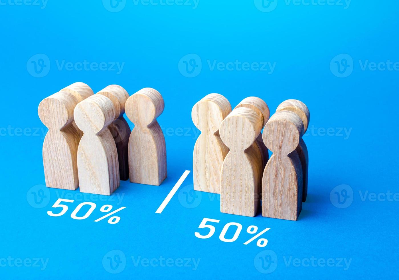 The group of people is divided equally by line. Visualization of statistical data. 50 of 100. Dividing people into two groups on different issues. Polls test results photo