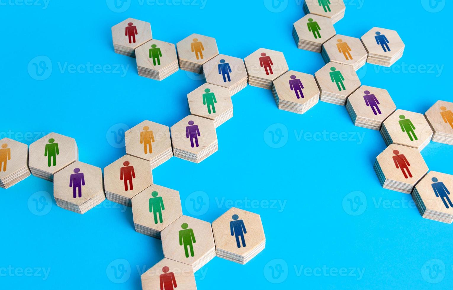 Chain of communicating people. Cooperation for solving tasks. Unity and diversity. Networking. Multiculturalism. Connecting a group of people, uniting around an idea. Assistance and collaboration. photo