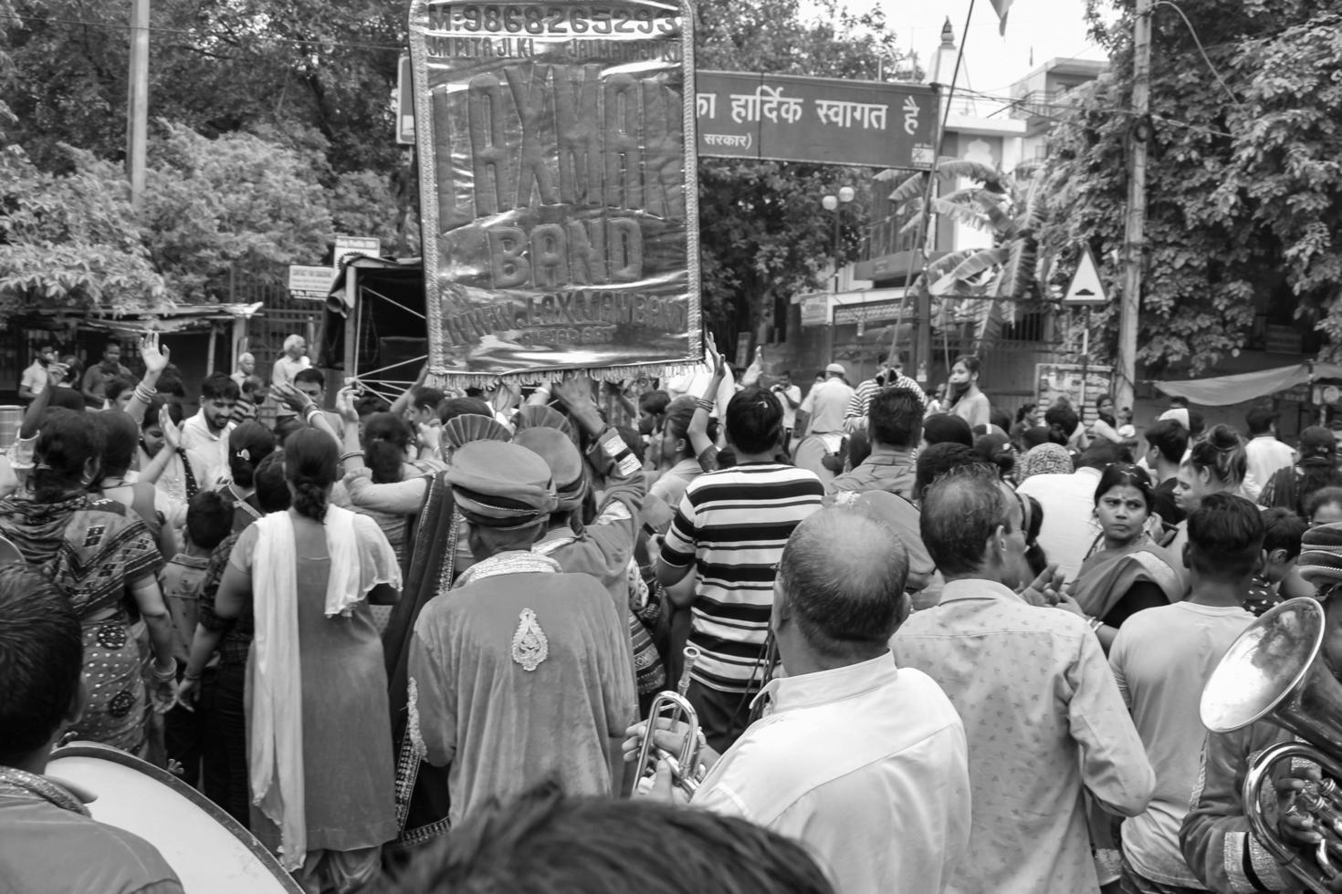 New Delhi, India July 01 2022 - A huge gathering of devotees from different parts of Delhi on the occasion of ratha yatra or rathyatra. Rath for Lord Jagannath pulled by people, Jagannath Rath Yatra photo