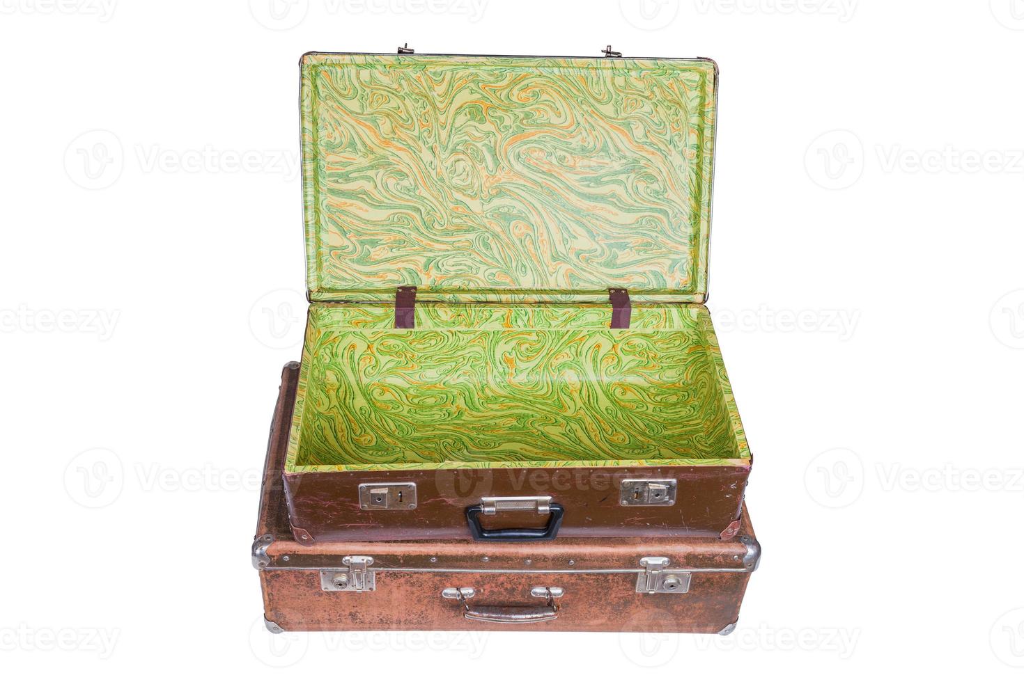 old brown soviet fiber suitcases one on top of other isolated on white photo
