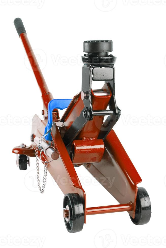 red hydraulic car jack isolated on white background, rised up photo