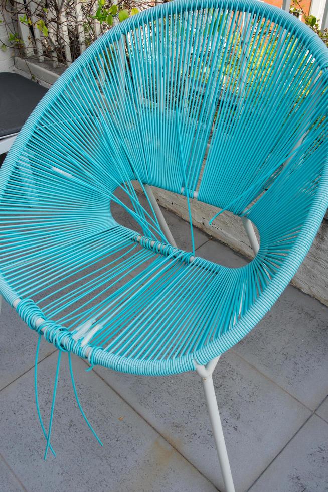 Close up of a broken terrace chair to be renewed photo