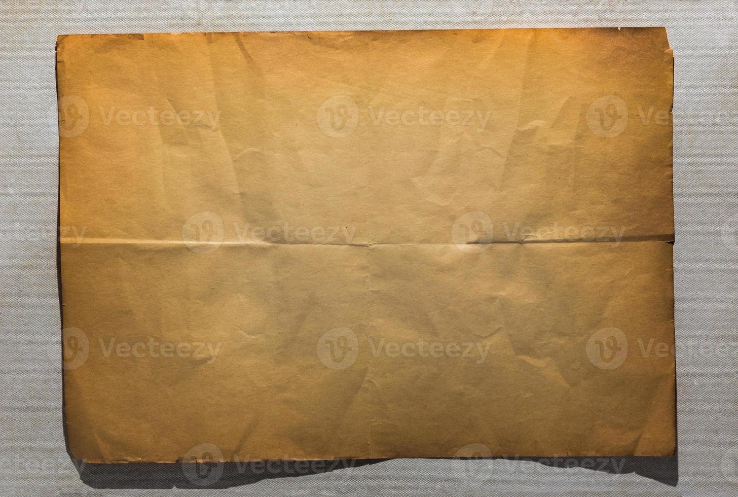 single old folded flat sheet of paper photo