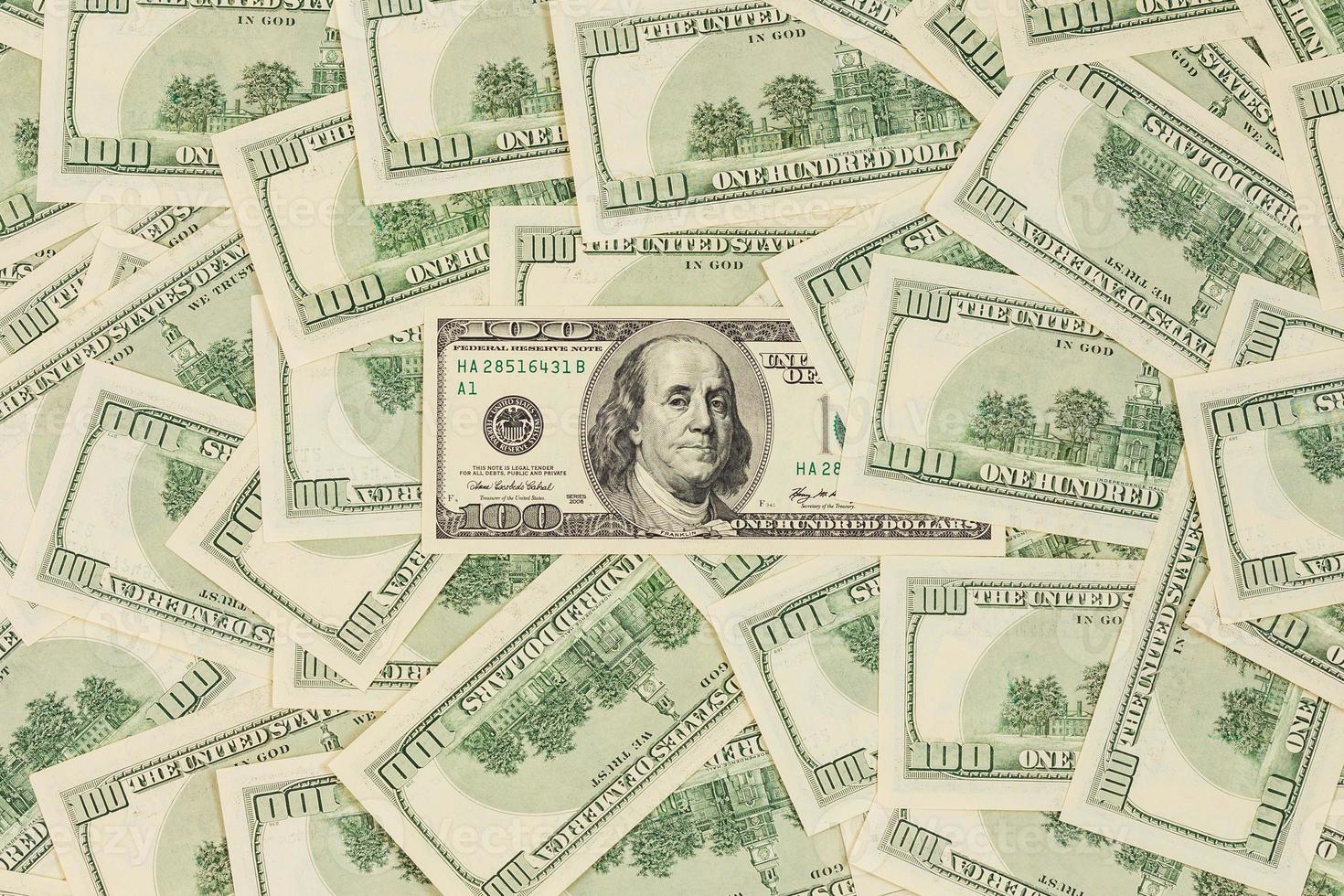 one hundred us dollar banknotes flat background photo