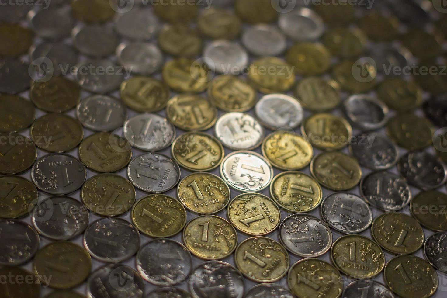 One rubl coins dark close-up background with selective focus photo