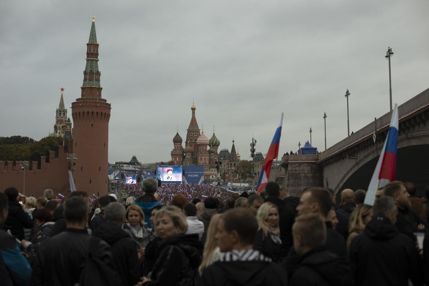 Moscow, Russia. 09 30 2022 Kremlin in Moscow. Rally in Russia. Russians with flags. photo