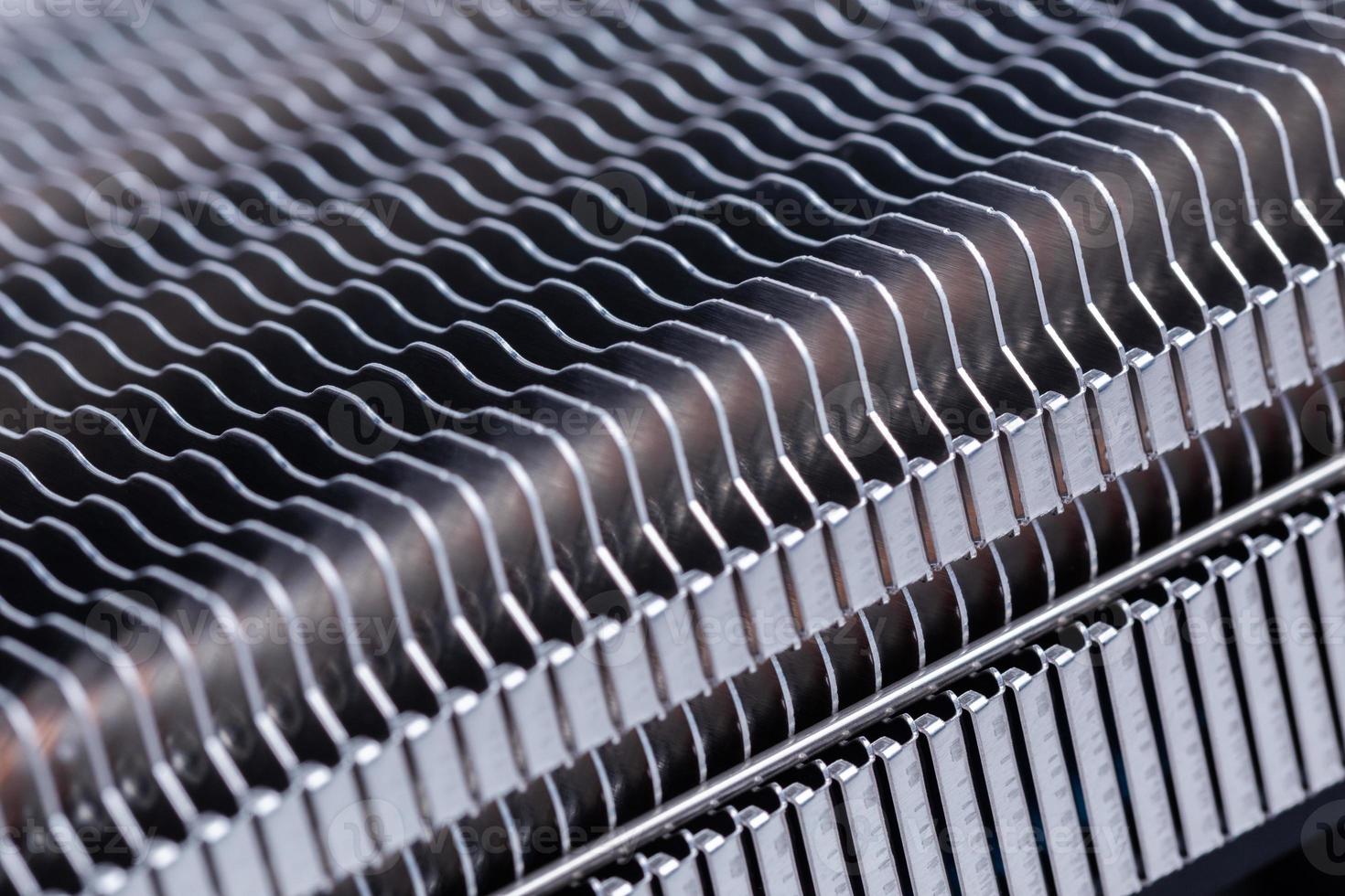 modern large heat radiator unit closeup macro background with selective focus photo