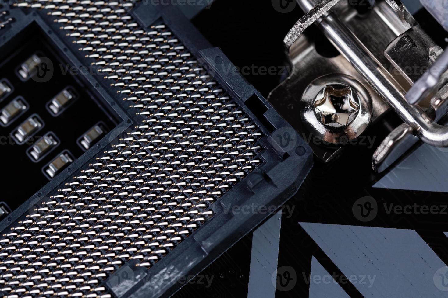 opened central processor LGA slot on pc mainboard - closeup shot photo