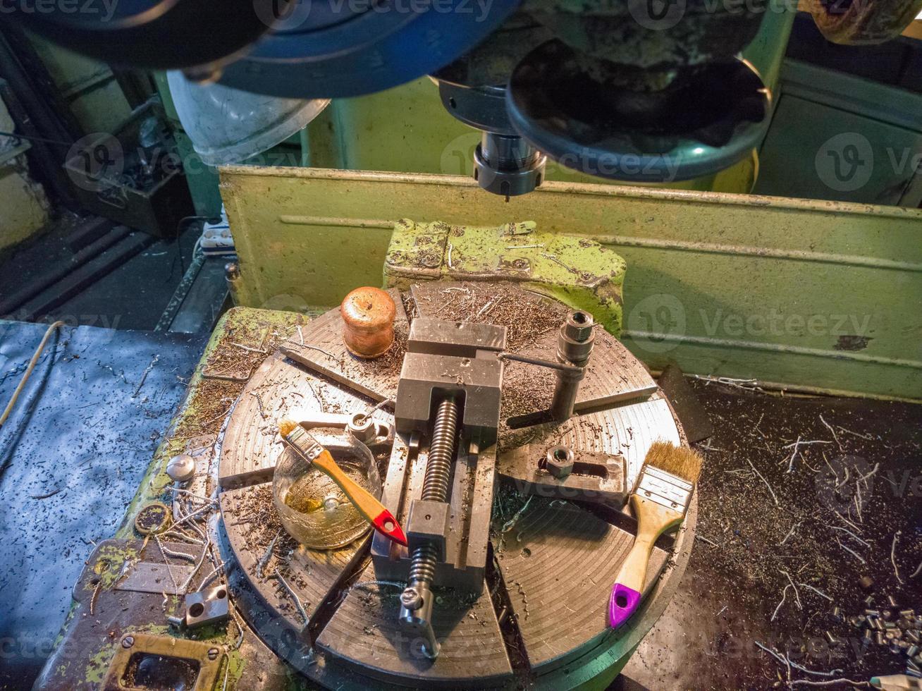 industrial wise on rotating table with chips photo