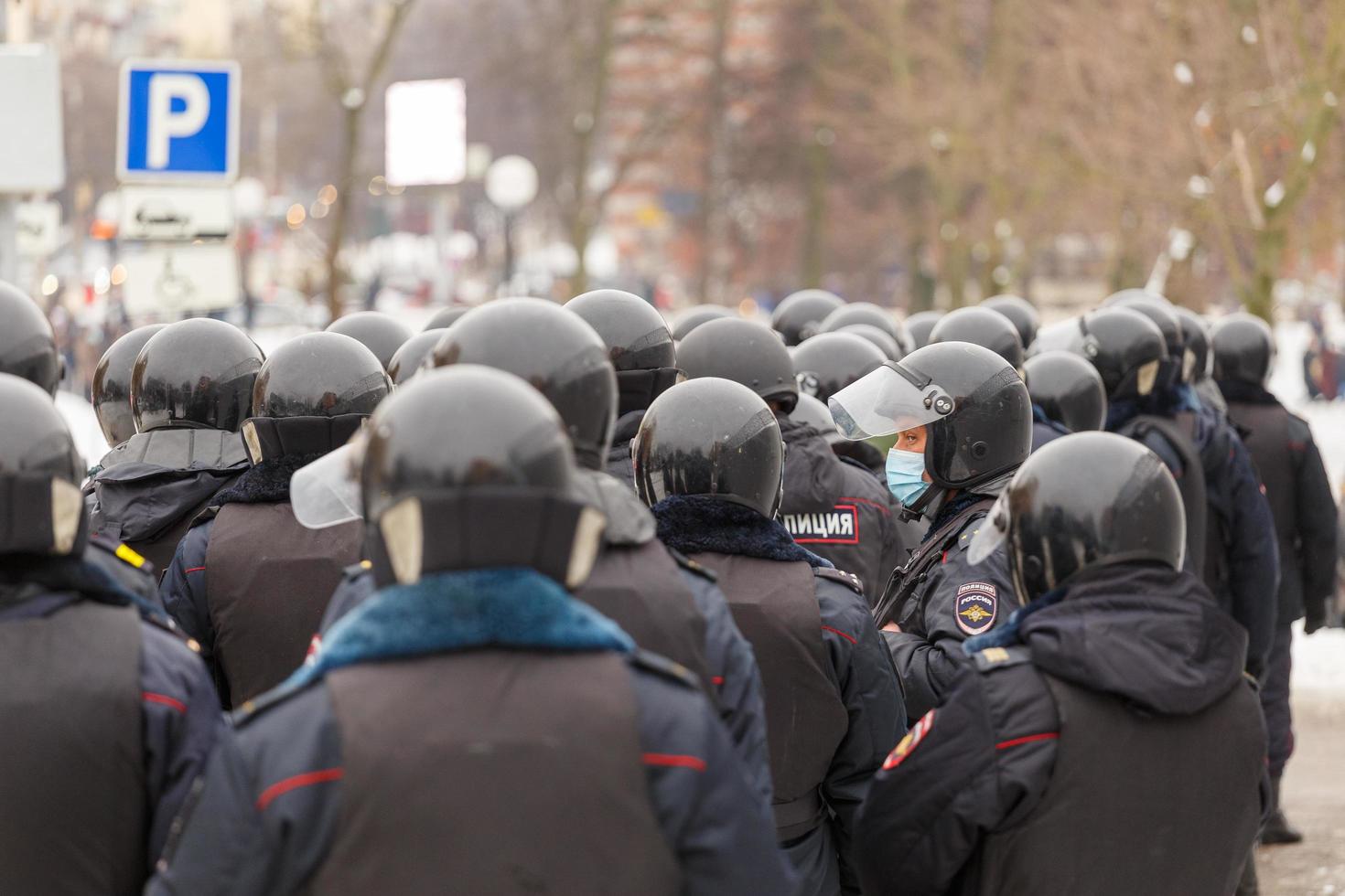 TULA, RUSSIA JANUARY 23, 2021 Public meeting in support of Navalny, police officers in black helmets wait for the command to arrest the protesters. photo