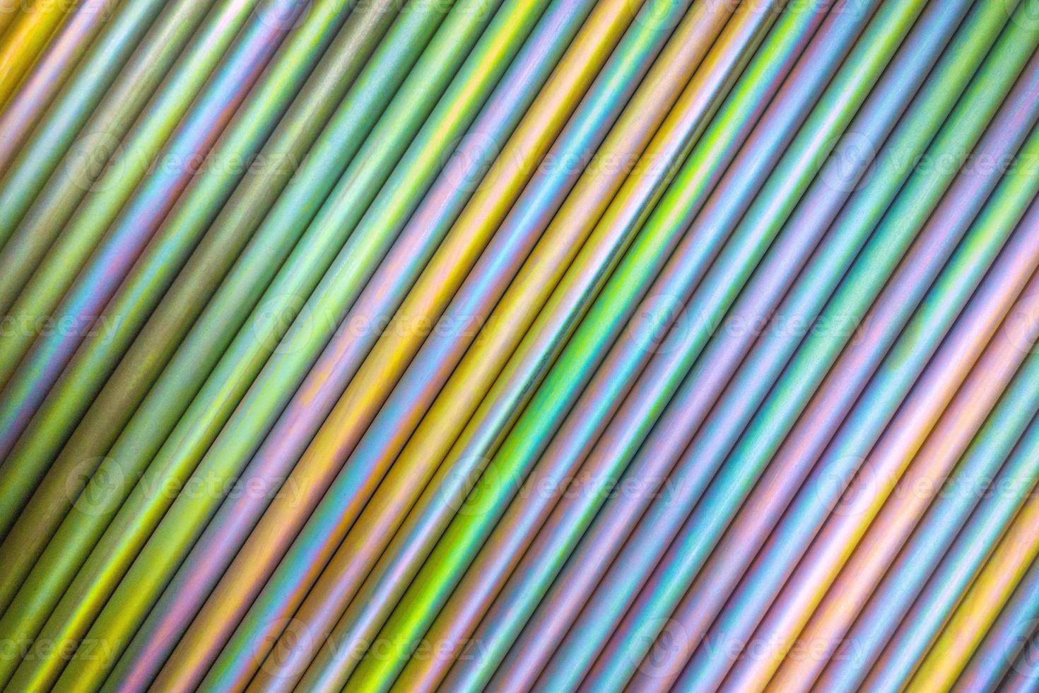 An abstract lines backround of colorful cadmium coated steel bars. photo