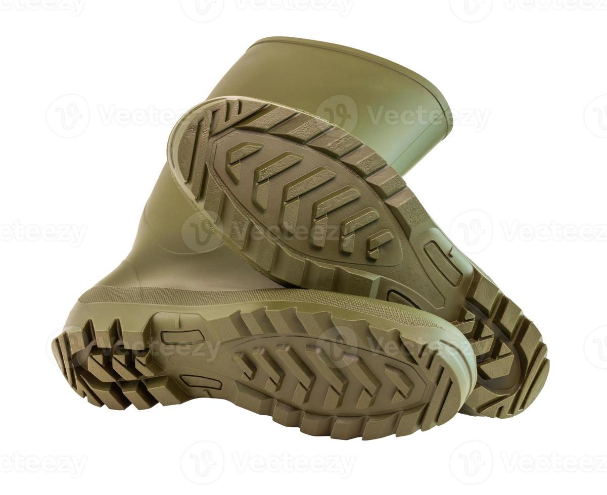 a pair of olive green clean and new rubber boots isolated on white background photo