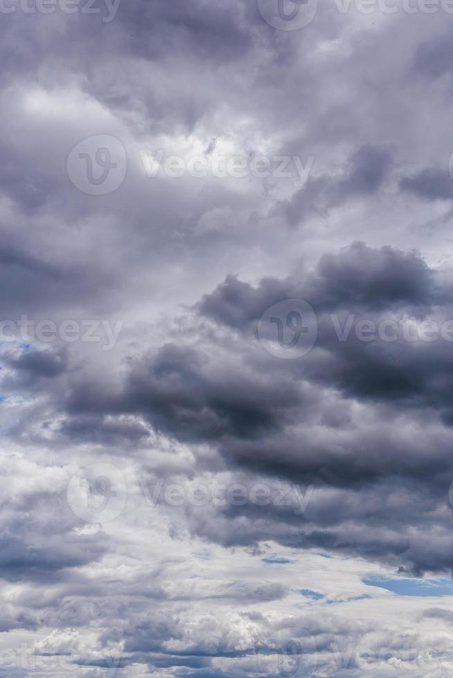 gray incoming near storm clouds at daylight backdrop photo
