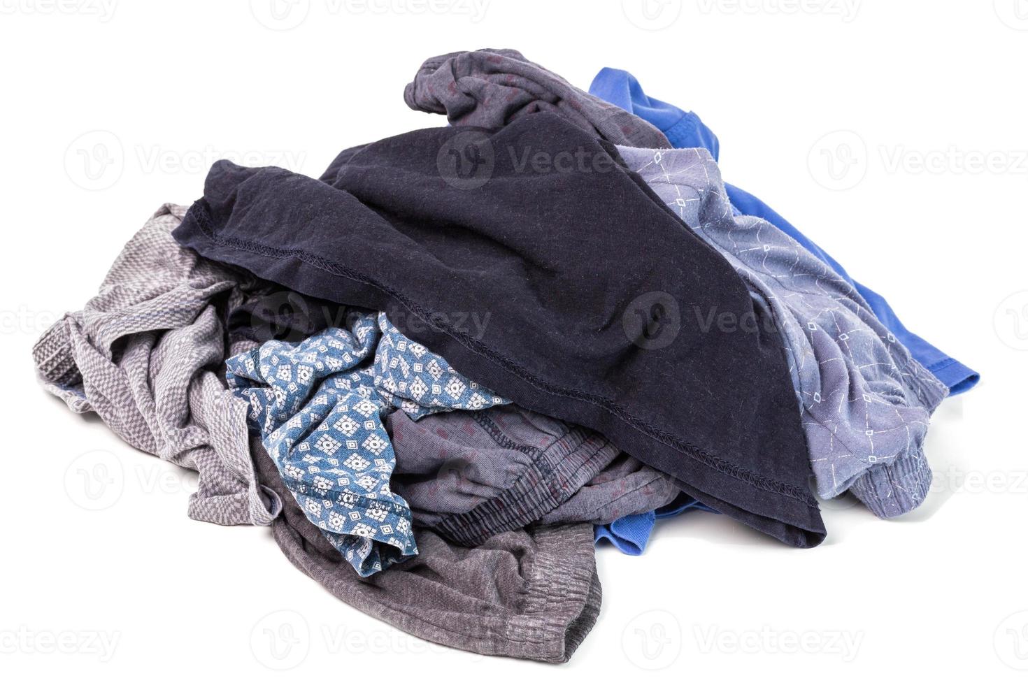 a small pile of clean and dry panties and t-shirts - isolated on white background photo