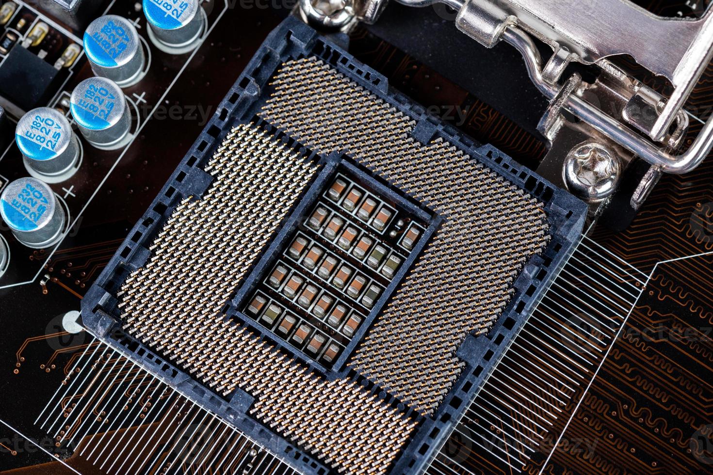 opened central processor LGA slot on pc mainboard - closeup shot photo