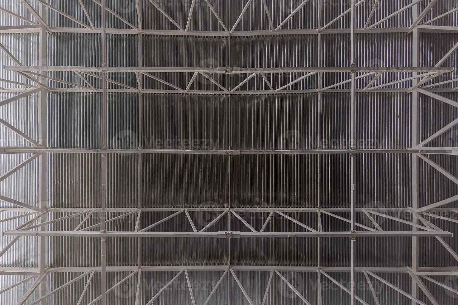 Industrial ceiling with profiled sheet and girder beam system flat background. photo