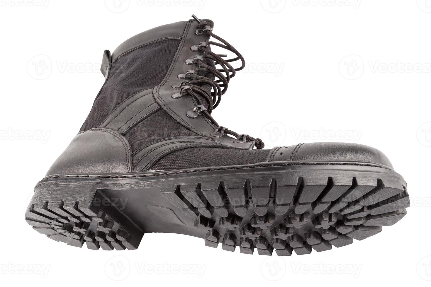 new black lightweight military boot isolated on white background, lying on side photo
